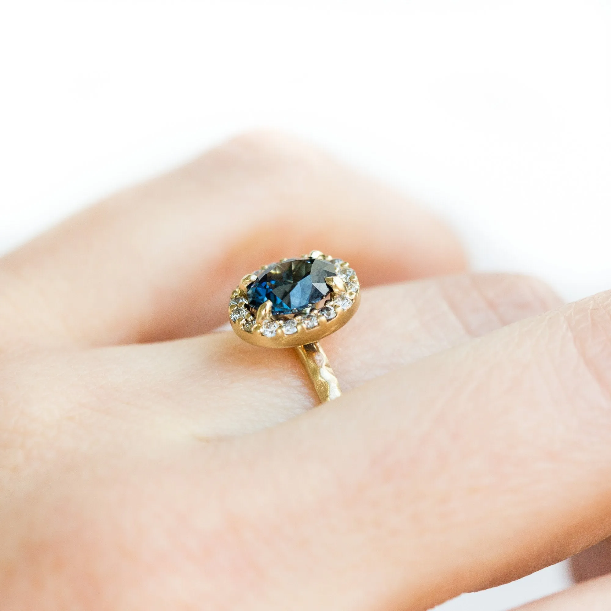 1.32ct Royal Blue Oval Sapphire Halo Ring - Evergreen Carved Band in a Satin Finish 14k Yellow Gold